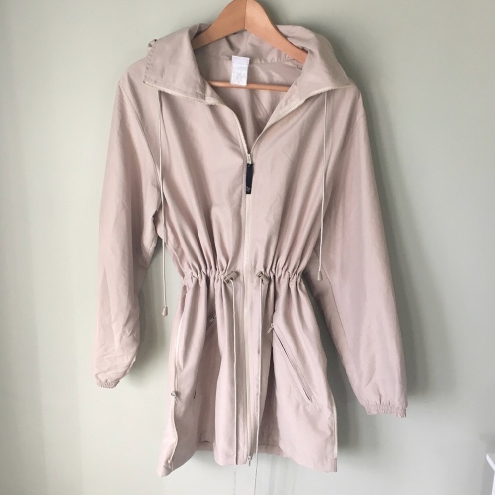 Tan packable hooded raincoat
